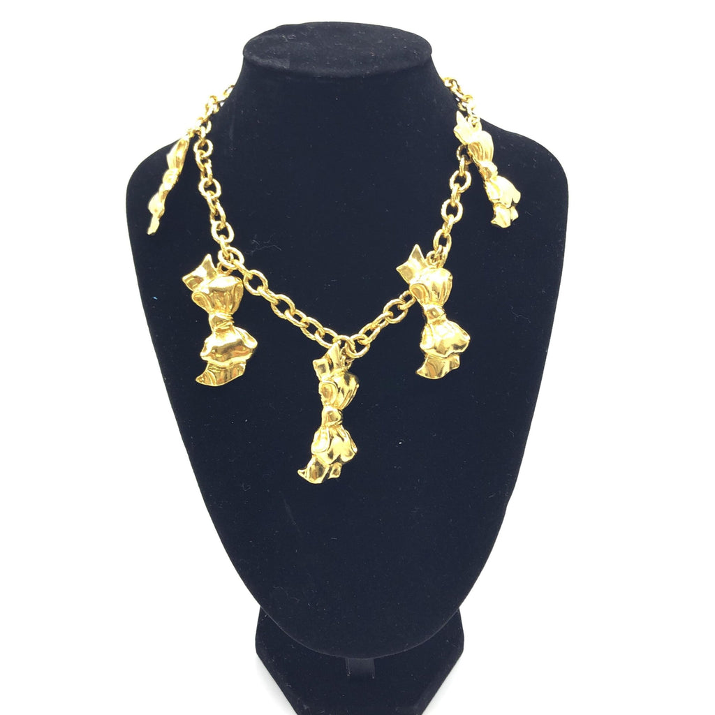 Collana a catena placcata oro Chanel con ciondoli a fiocco
