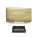 Portafoglio a soffietto in pelle di caviale color oro Chanel