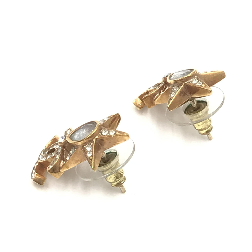 Orecchini Chanel placcati oro con stella, logo Coco e strass
