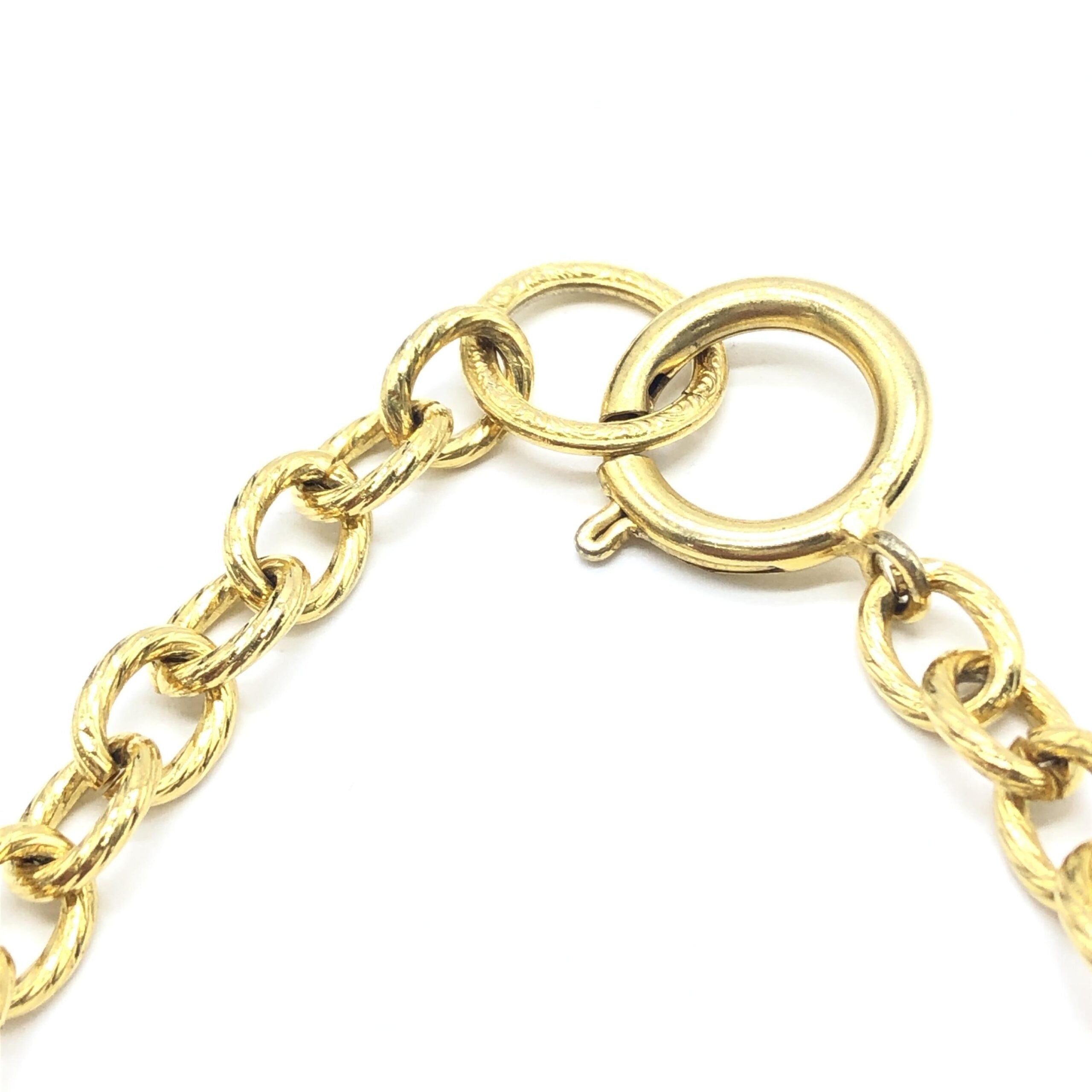 Collana a catena placcata oro Chanel con ciondoli a fiocco