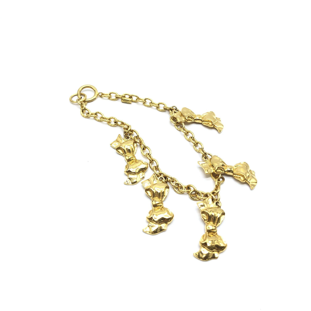 Collana a catena placcata oro Chanel con ciondoli a fiocco