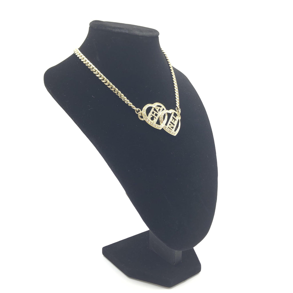 Collana Choker Chanel color oro a cuore con logo