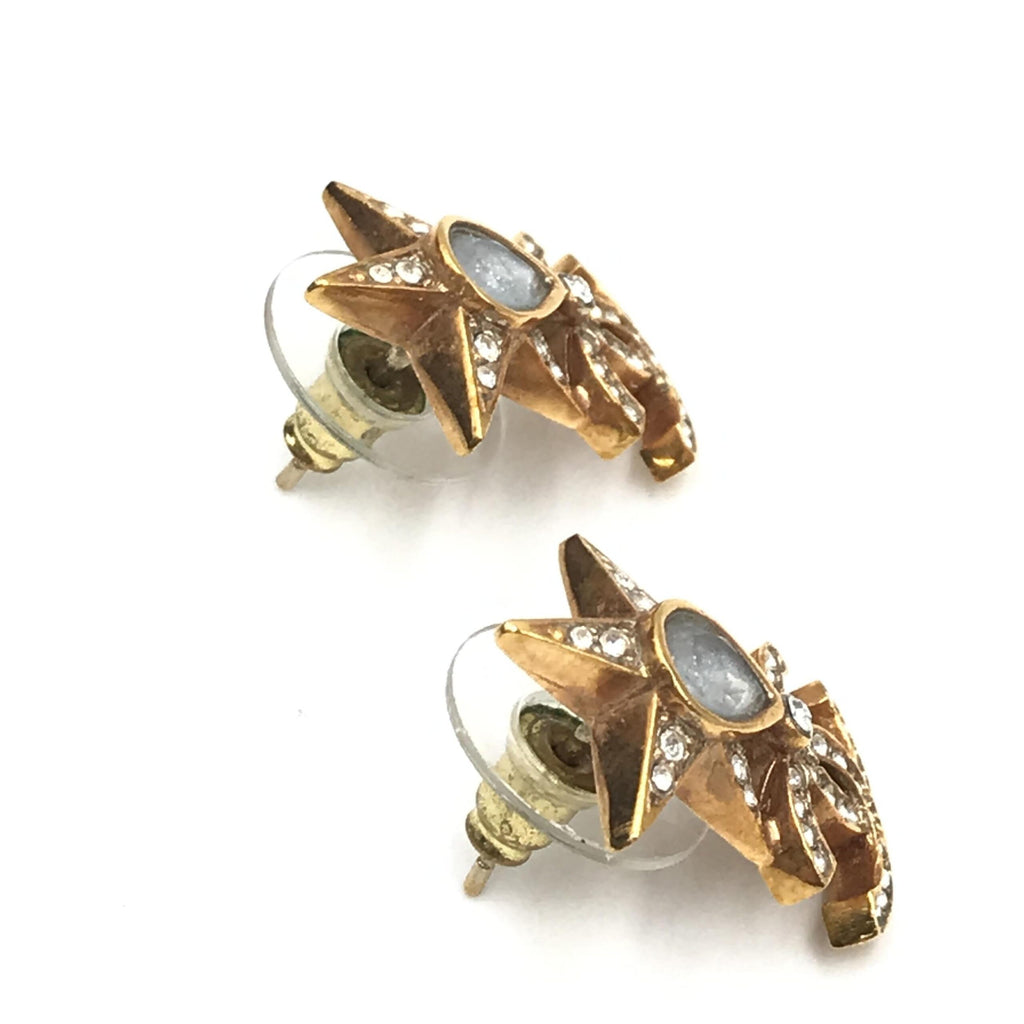Orecchini Chanel placcati oro con stella, logo Coco e strass