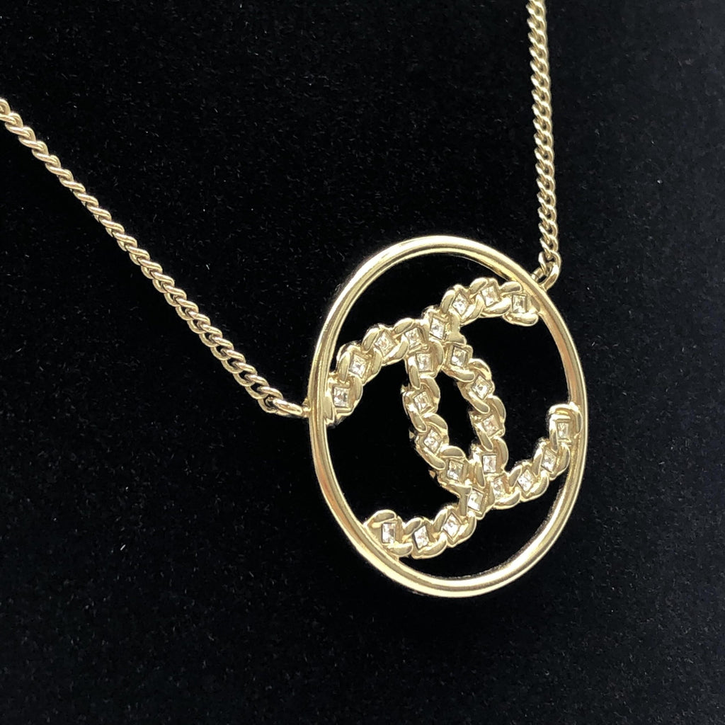 Collana con pendente tondo a doppia C color oro Chanel
