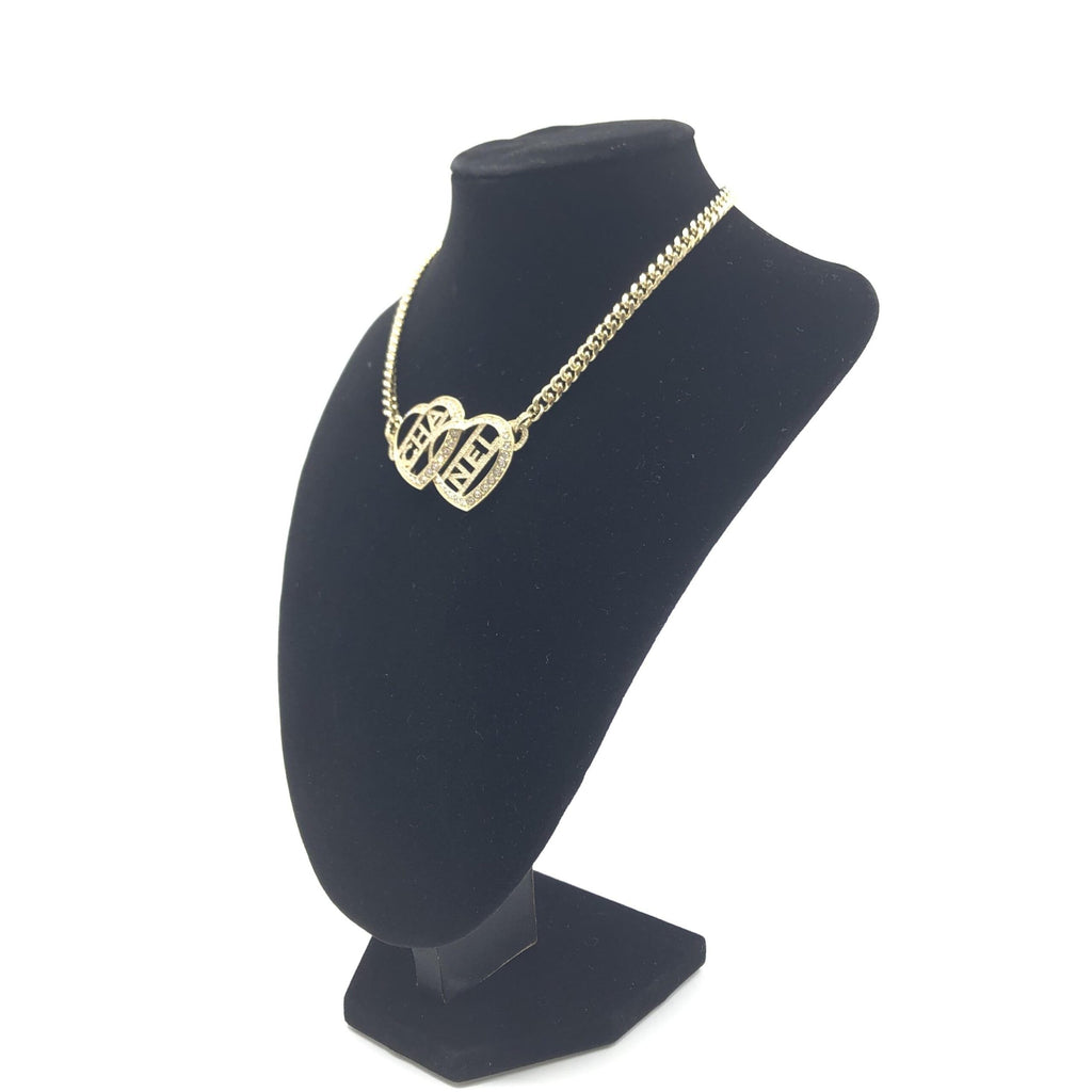 Collana Choker Chanel color oro a cuore con logo