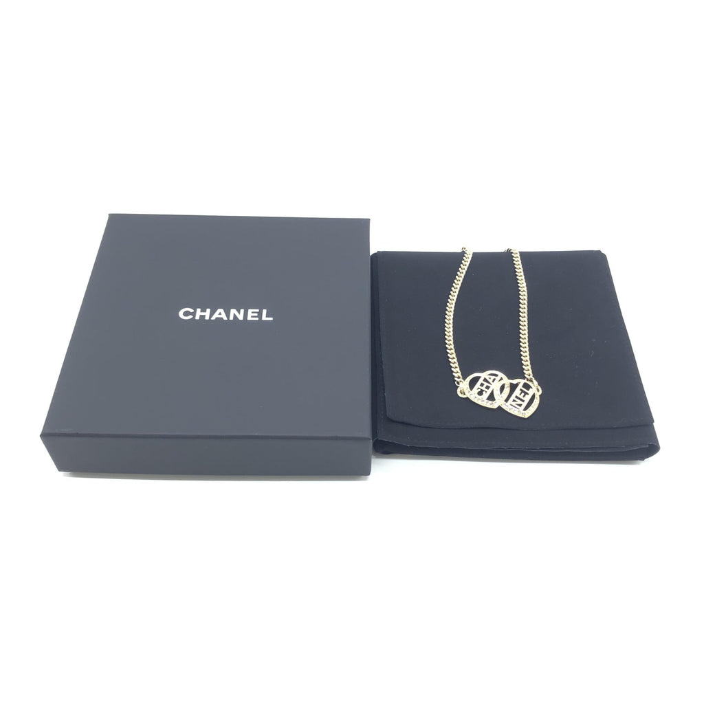 Collana Choker Chanel color oro a cuore con logo
