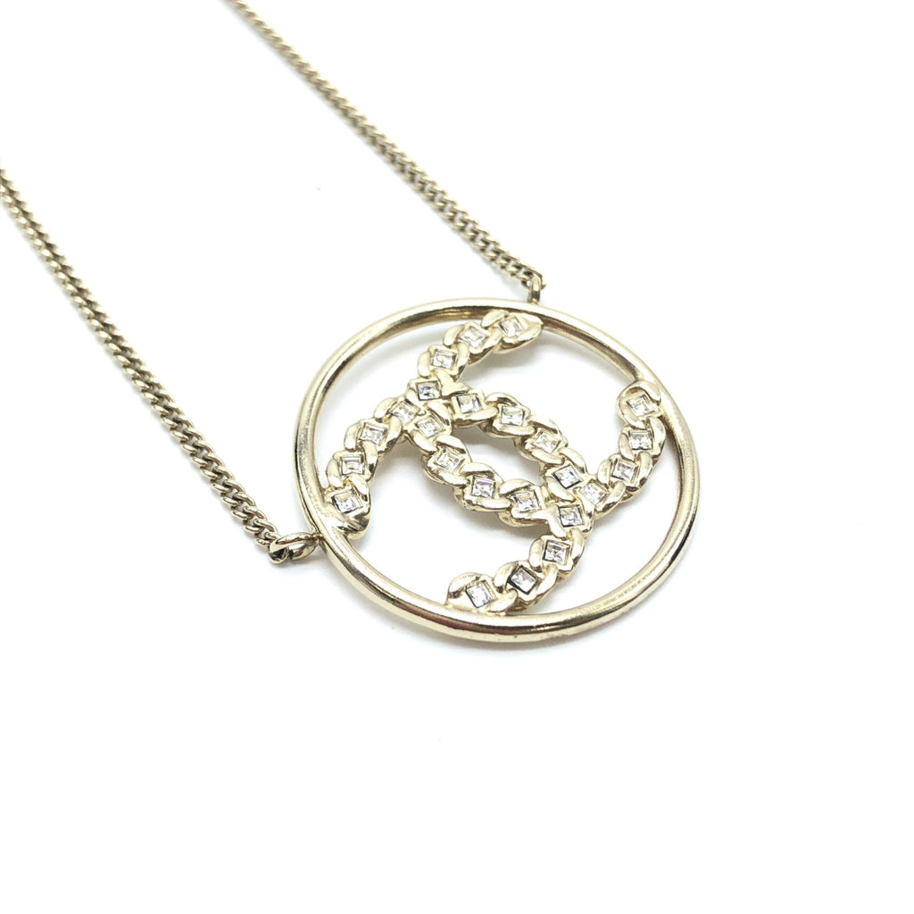 Collana con pendente tondo a doppia C color oro Chanel