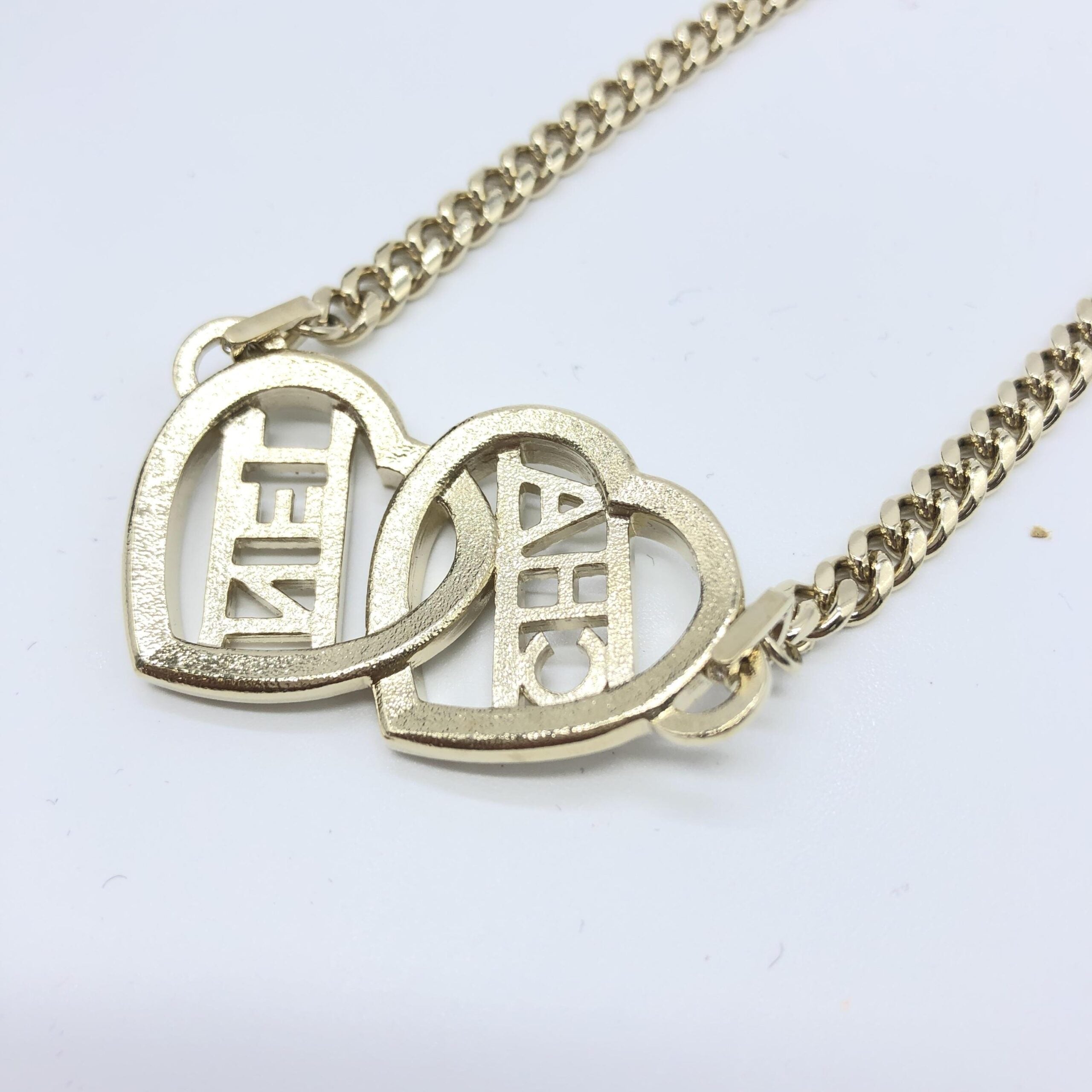 Collana Choker Chanel color oro a cuore con logo