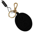 Portachiavi Dolce & Gabbana in gomma nera con logo DG in metallo ottone dorato