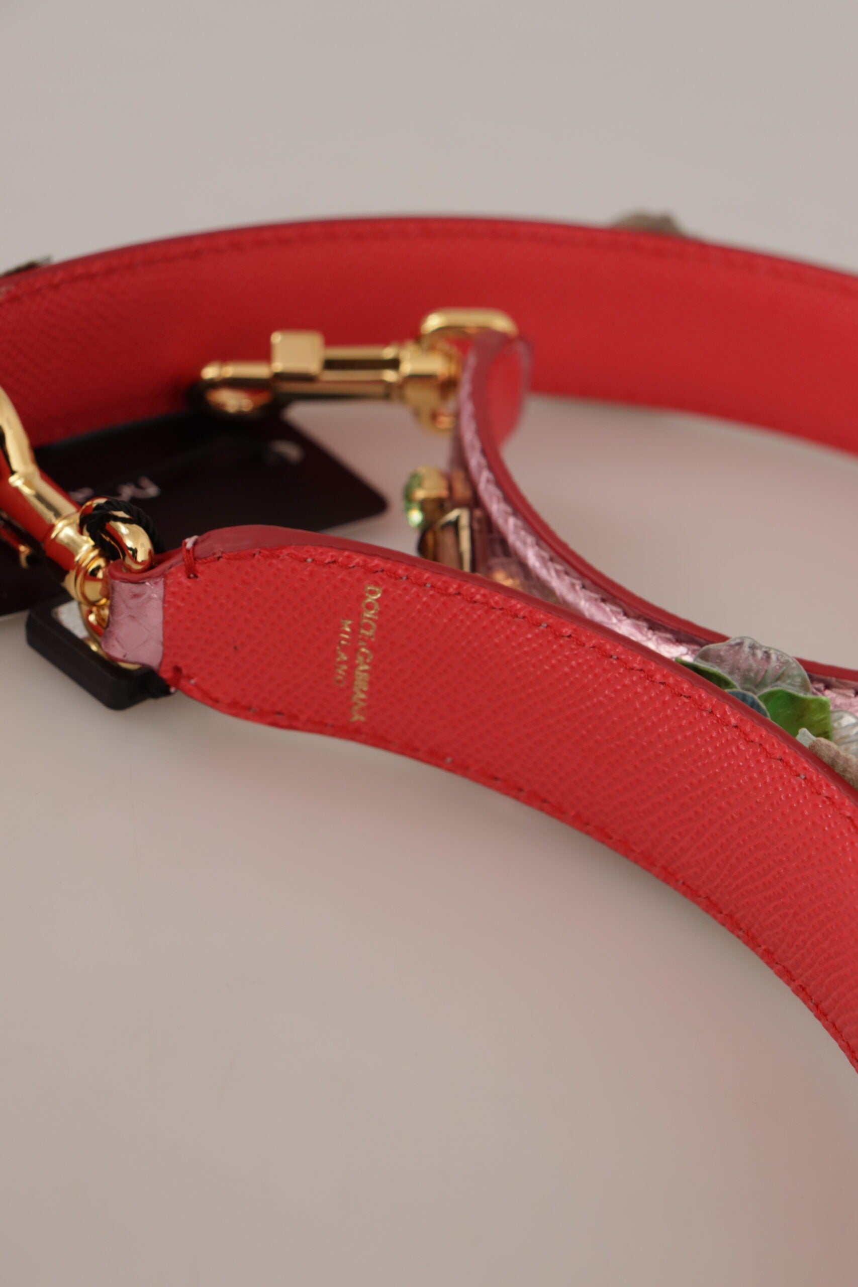 Tracolla in pelle rosa metallizzata con borchie Dolce & Gabbana