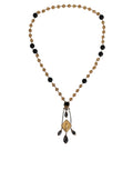Collana Dolce & Gabbana stile rosario con perline nere e catena in ottone color oro