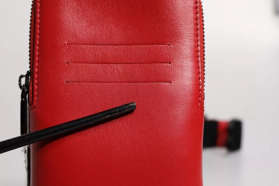 Portacarte con cerniera, logo e tracolla larga in pelle rossa Dolce & Gabbana