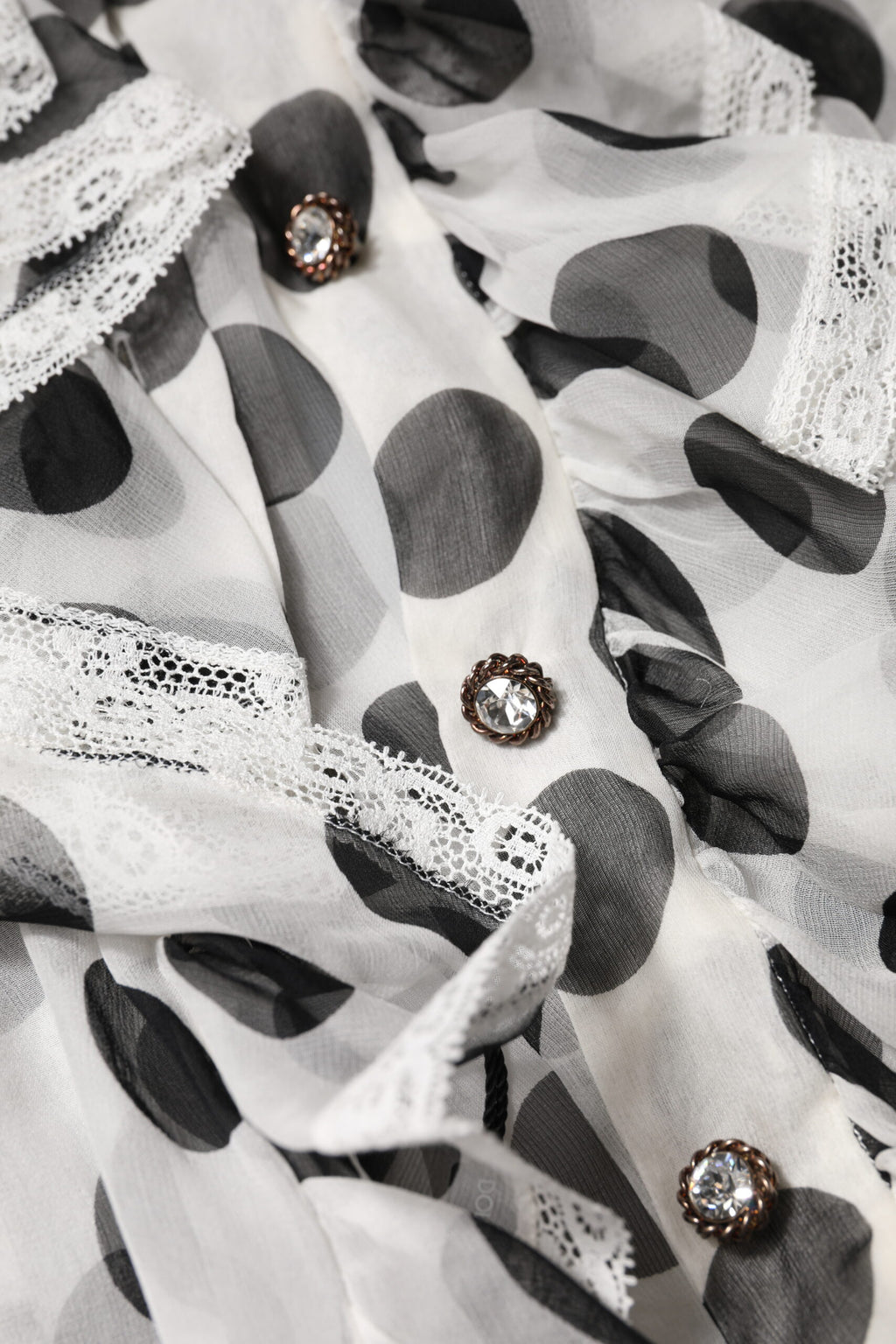 Top smanicato Dolce & Gabbana in cotone bianco a pois neri