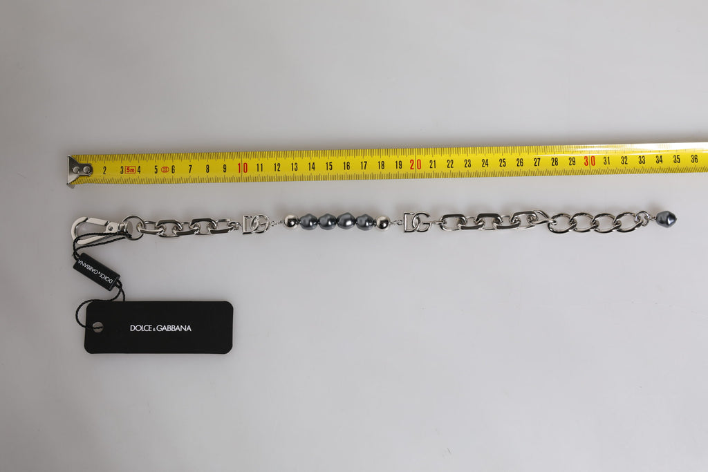 Bracciale Dolce & Gabbana con catena color argento, chiusura a moschettone, logo e perle grigie