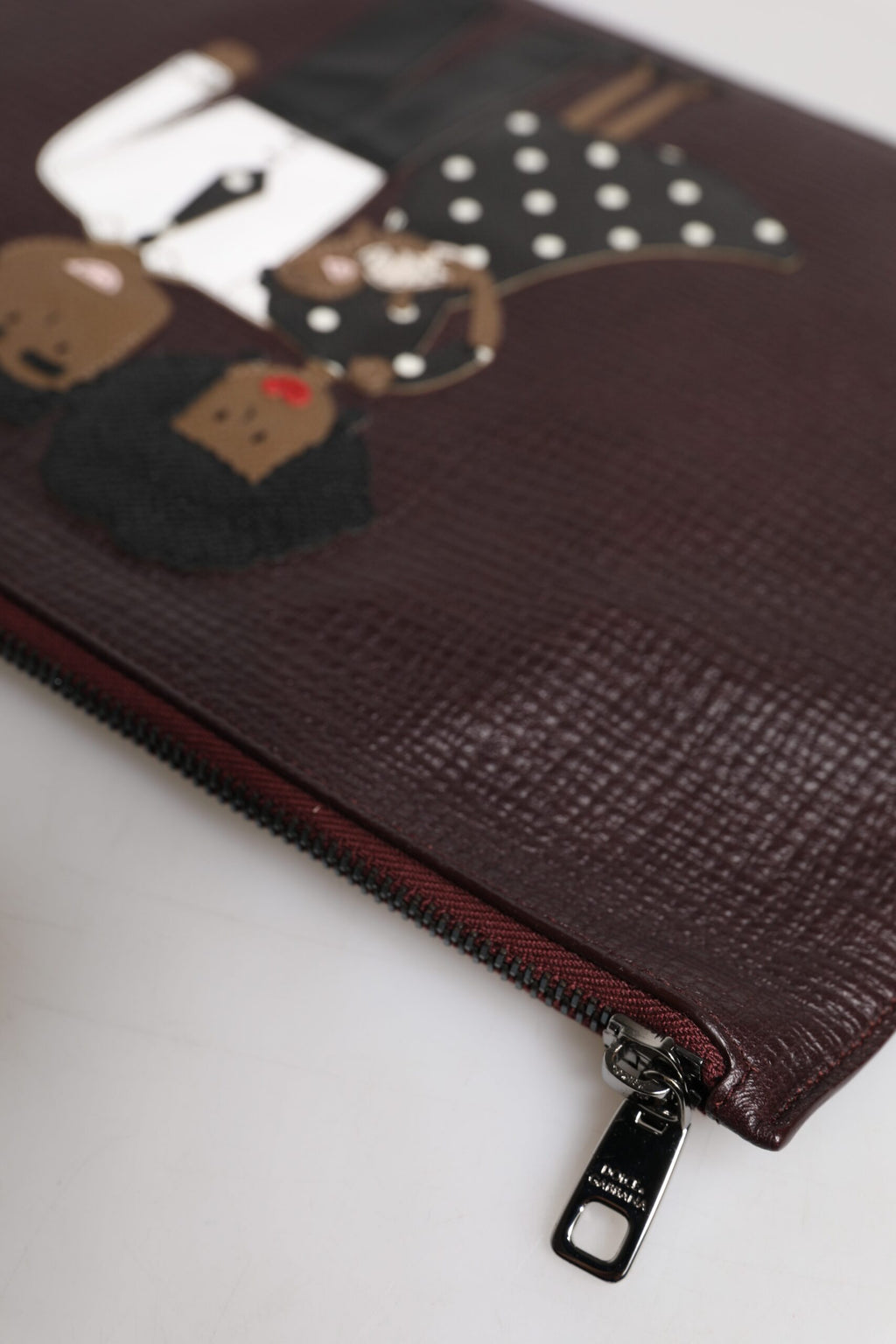 Pochette da uomo Dolce & Gabbana in pelle marrone con applicazioni #DGFAMILY