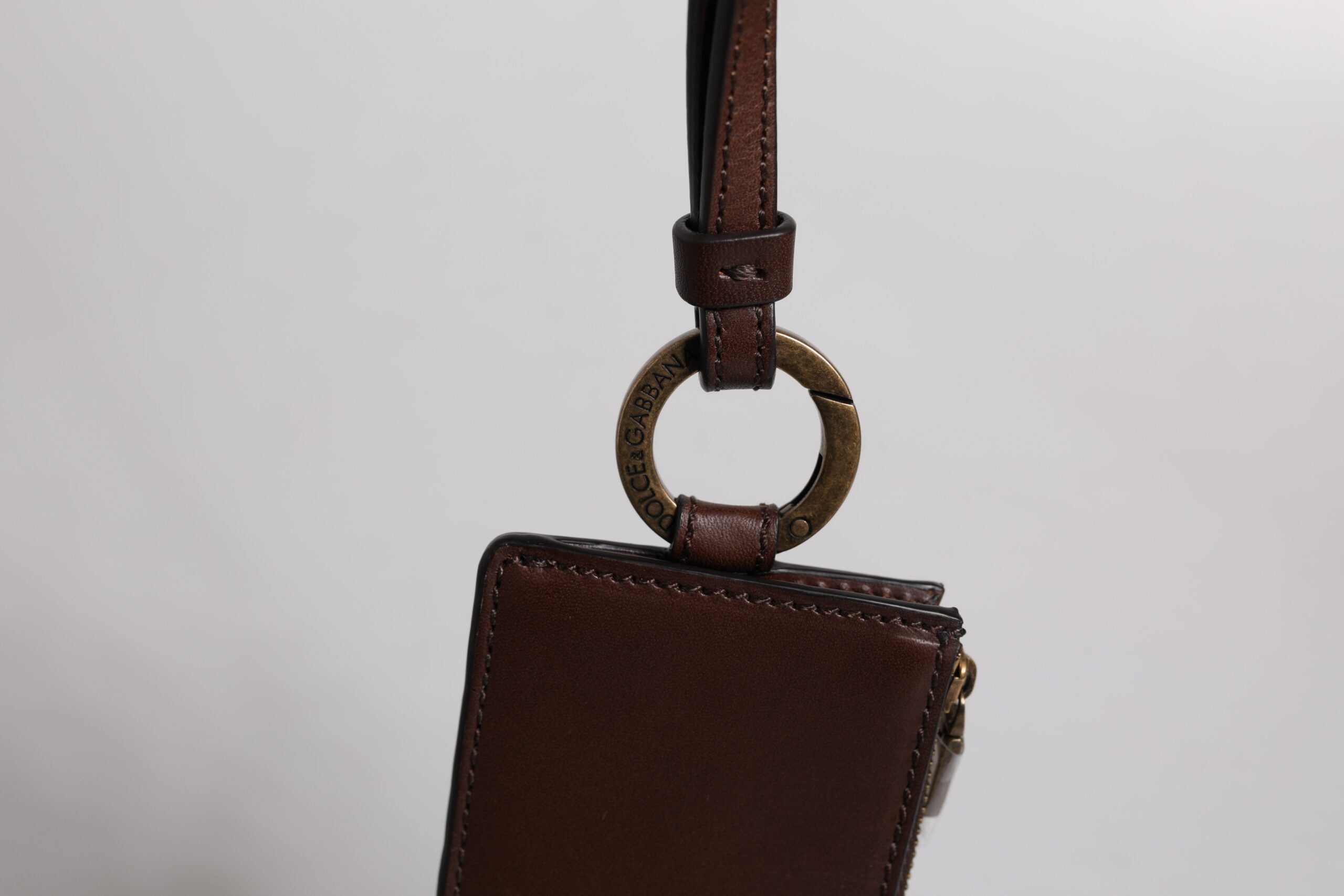 Portacarte e portafoglio con logo Dolce & Gabbana in pelle di vitello marrone con cordino