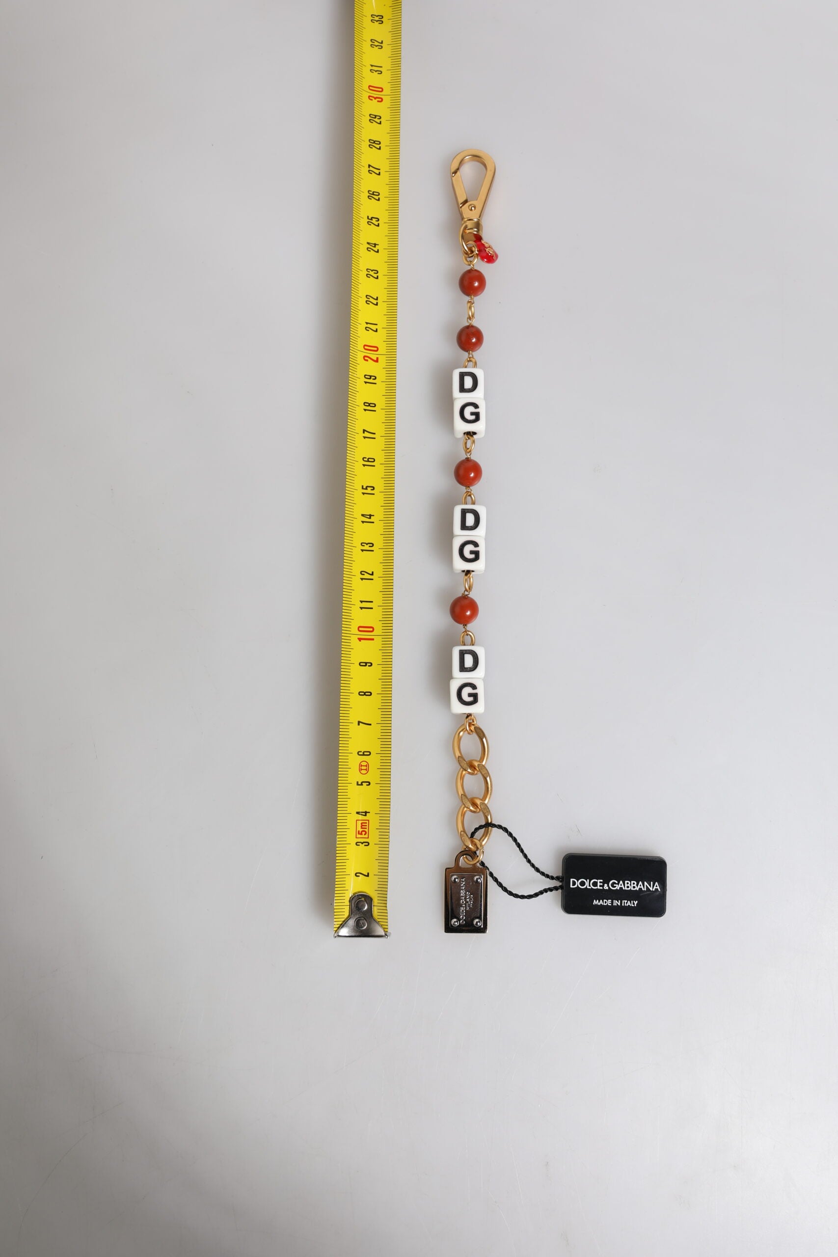 Dolce & Gabbana Bracciale Dadi con Logo DG in Catena di Ottone Dorato Multicolore