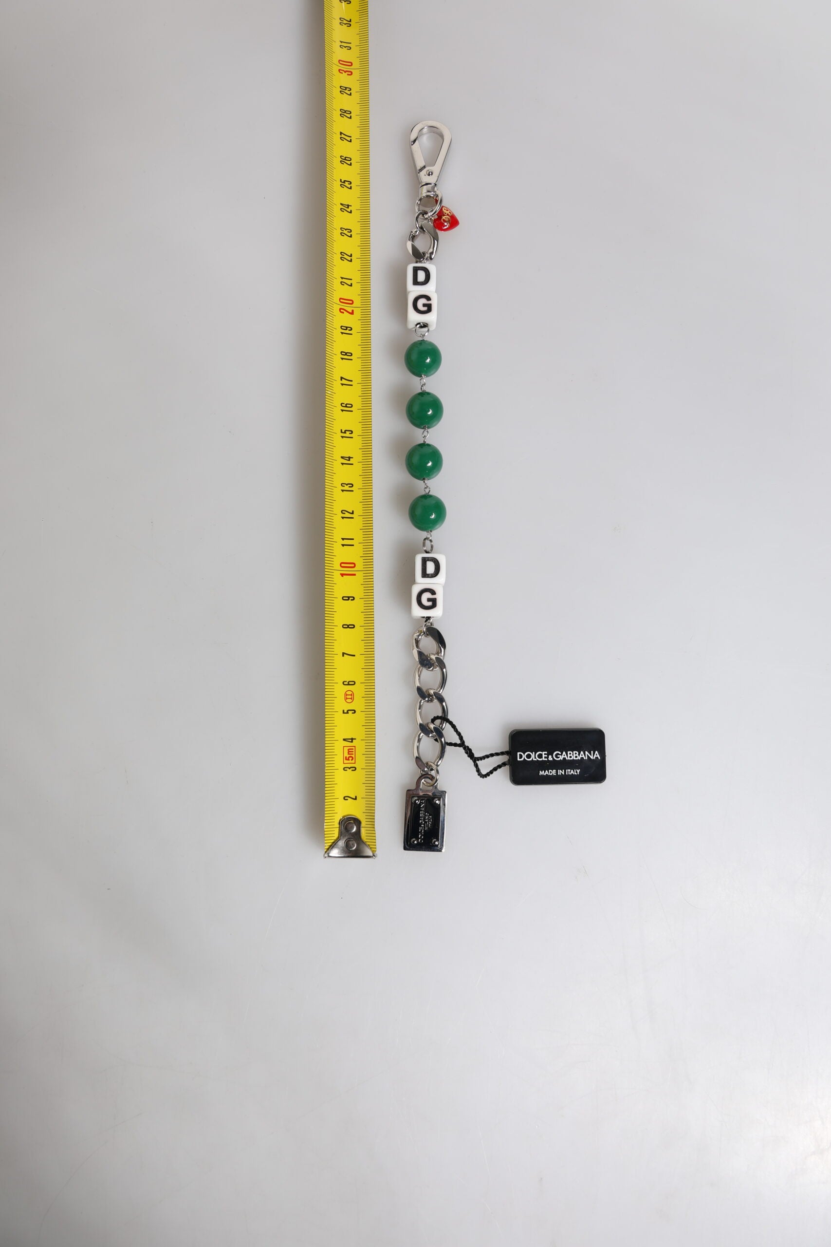 Bracciale con charm Dolce & Gabbana in ottone color argento, perline, dadi e logo