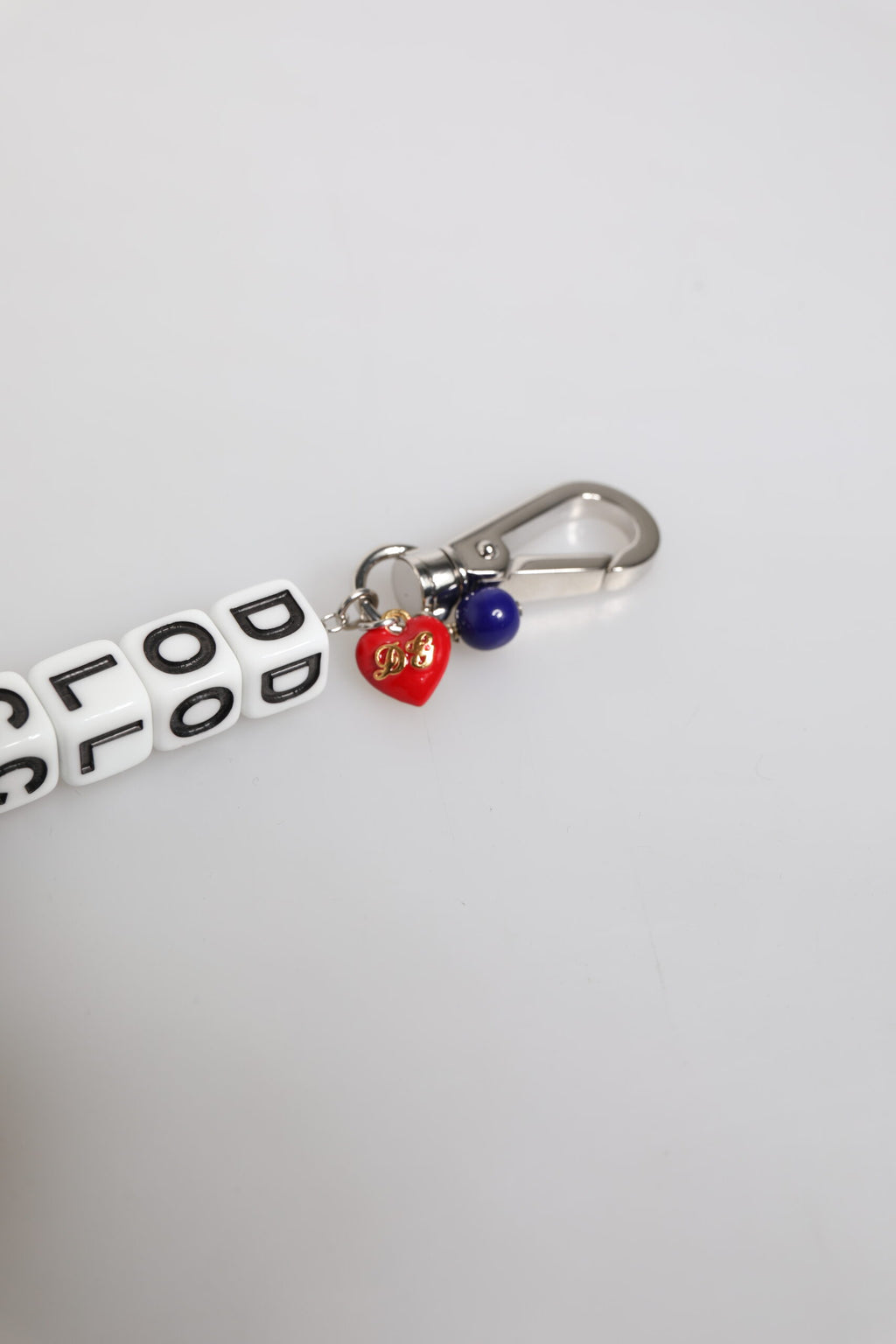 Bracciale Dolce & Gabbana con ciondolo a forma di dado in ottone color argento e logo