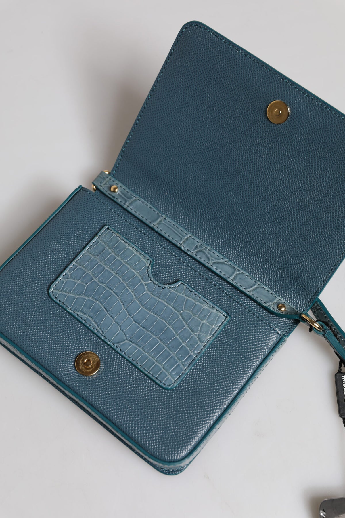 Mini borsa a tracolla Dolce & Gabbana in pelle esotica verde con placca DG