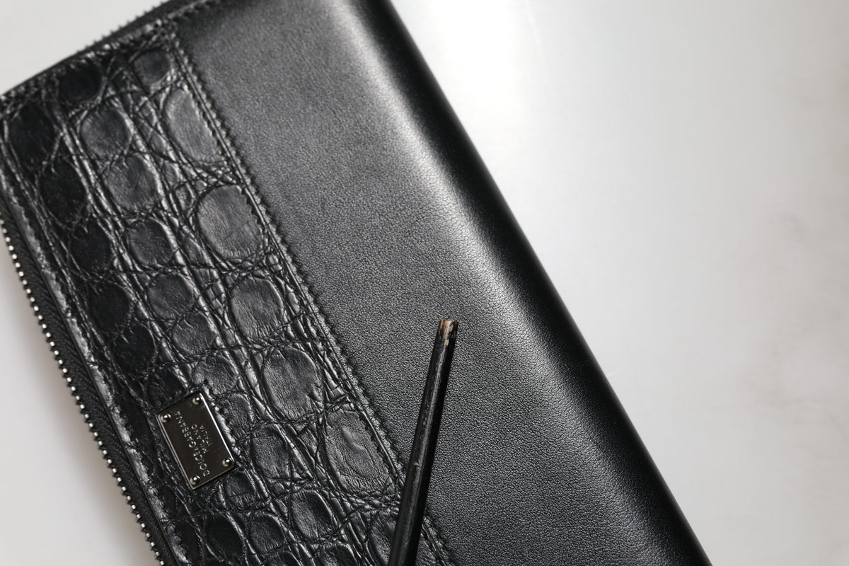Portafoglio continentale Dolce & Gabbana con cerniera a giro in pelle nera con placca DG