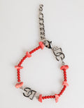 Bracciale da uomo Dolce & Gabbana a catena con perline in resina e logo DG in ottone color argento