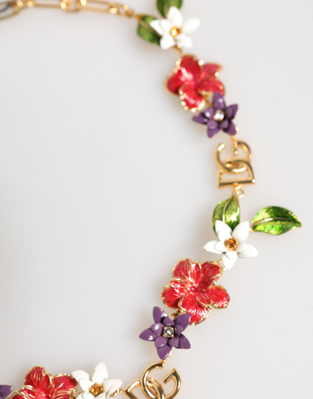 Collana Dolce & Gabbana con logo in ottone dorato e dettagli floreali, gioielli di moda