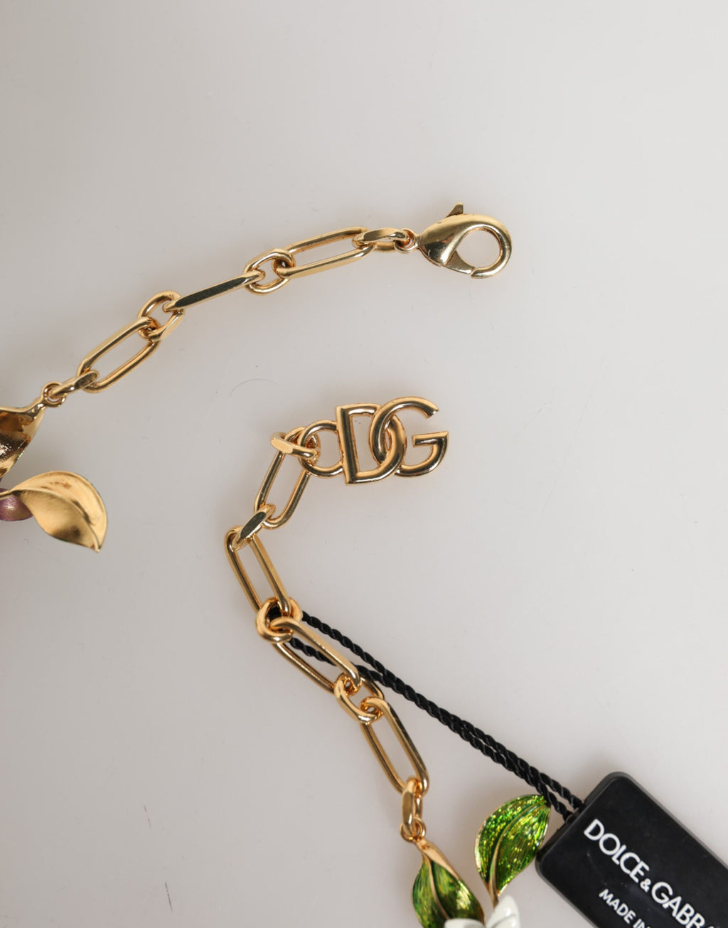 Collana Dolce & Gabbana con logo in ottone dorato e dettagli floreali, gioielli di moda