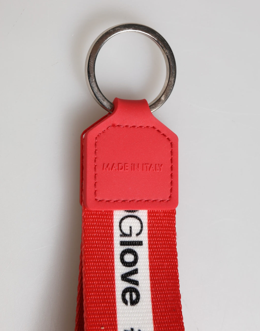 Dolce & Gabbana Portachiavi in poliestere rosso con logo e fermaglio in ottone argentato