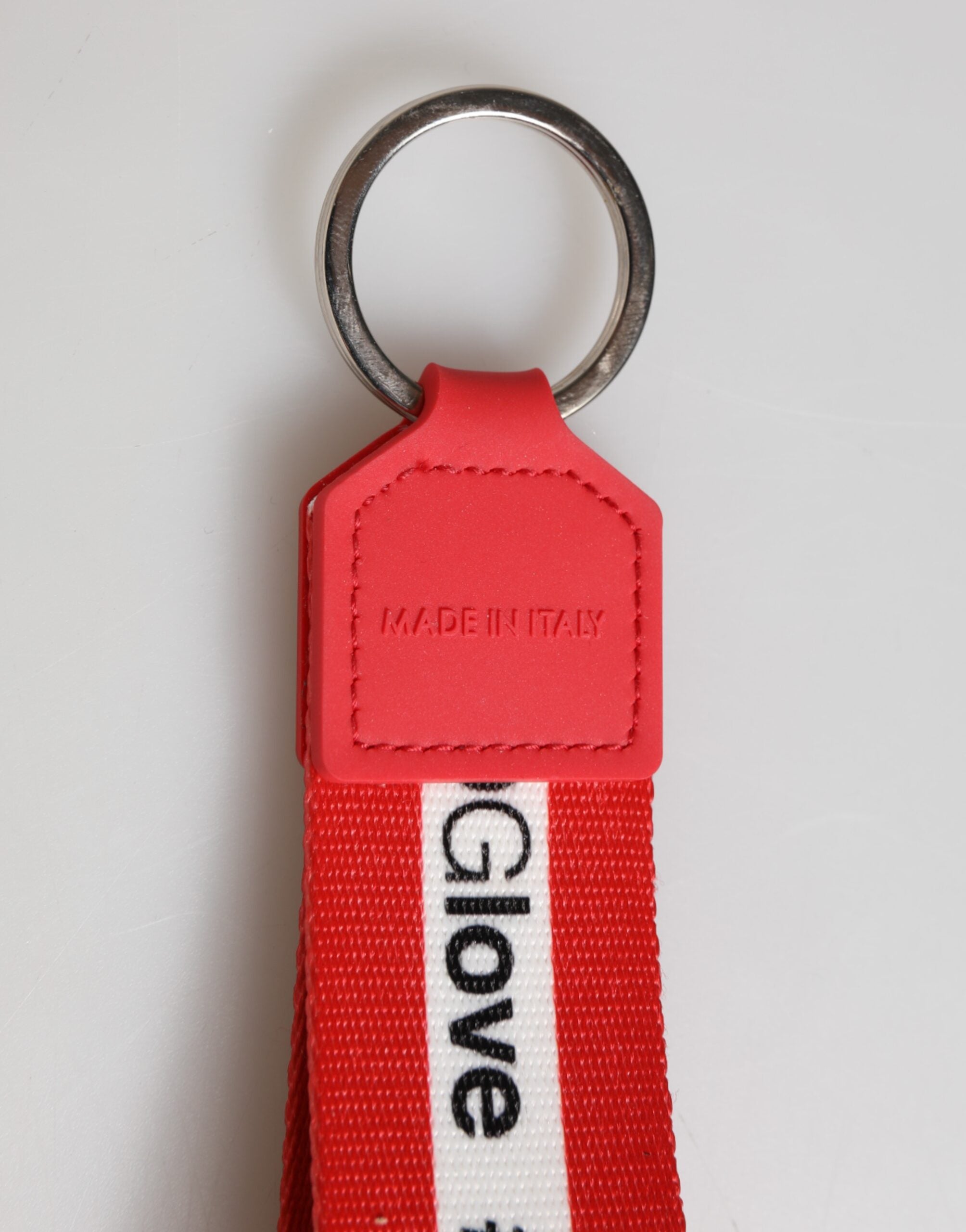Dolce & Gabbana Portachiavi in poliestere rosso con logo e fermaglio in ottone argentato