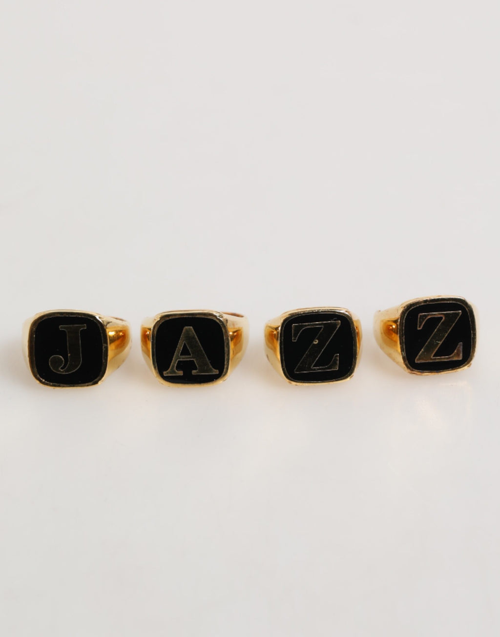 Dolce & Gabbana Anello regolabile, set di 4 pezzi con lettere "JAZZ" in ottone color oro