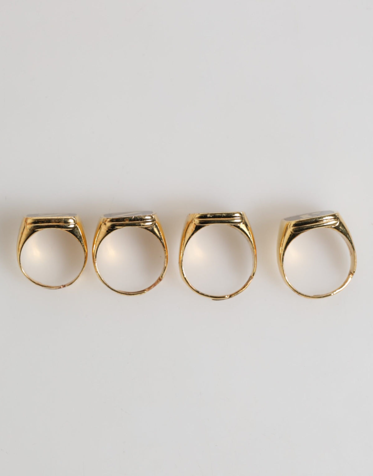 Dolce & Gabbana Anello regolabile, set di 4 pezzi con lettere "JAZZ" in ottone color oro