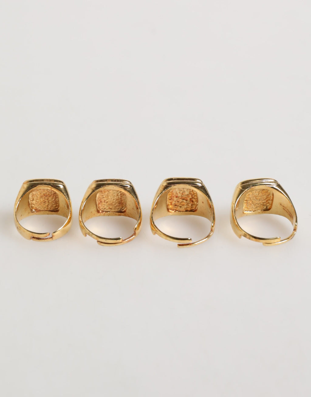 Dolce & Gabbana Anello regolabile, set di 4 pezzi con lettere "JAZZ" in ottone color oro