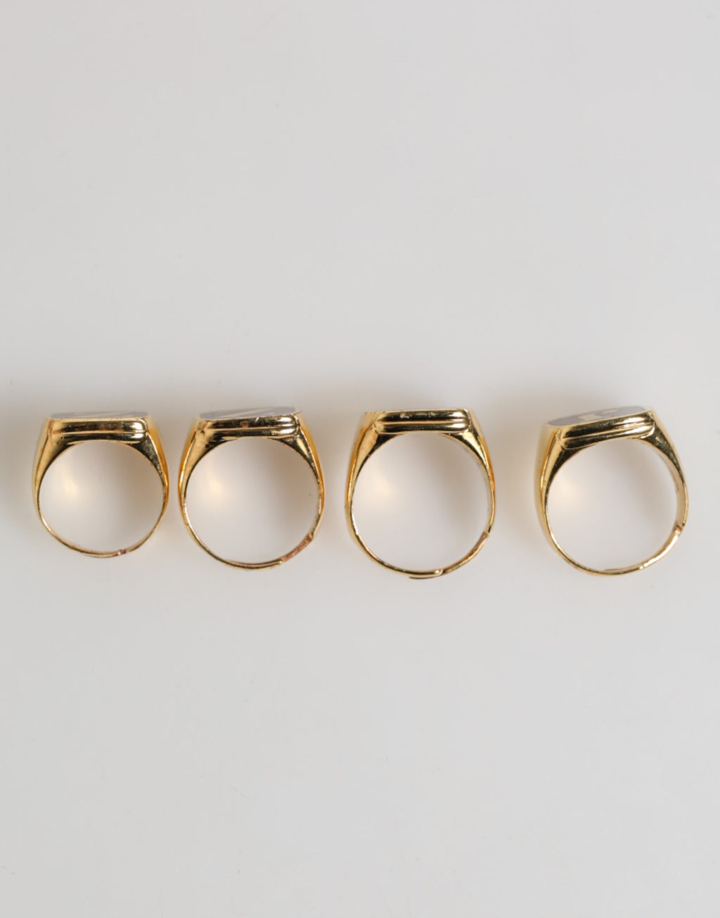 Dolce & Gabbana Anello regolabile, set di 4 pezzi con lettere "JAZZ" in ottone color oro