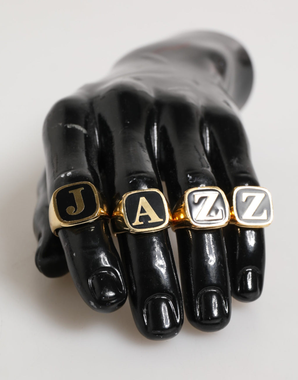 Dolce & Gabbana Anello regolabile, set di 4 pezzi con lettere "JAZZ" in ottone color oro