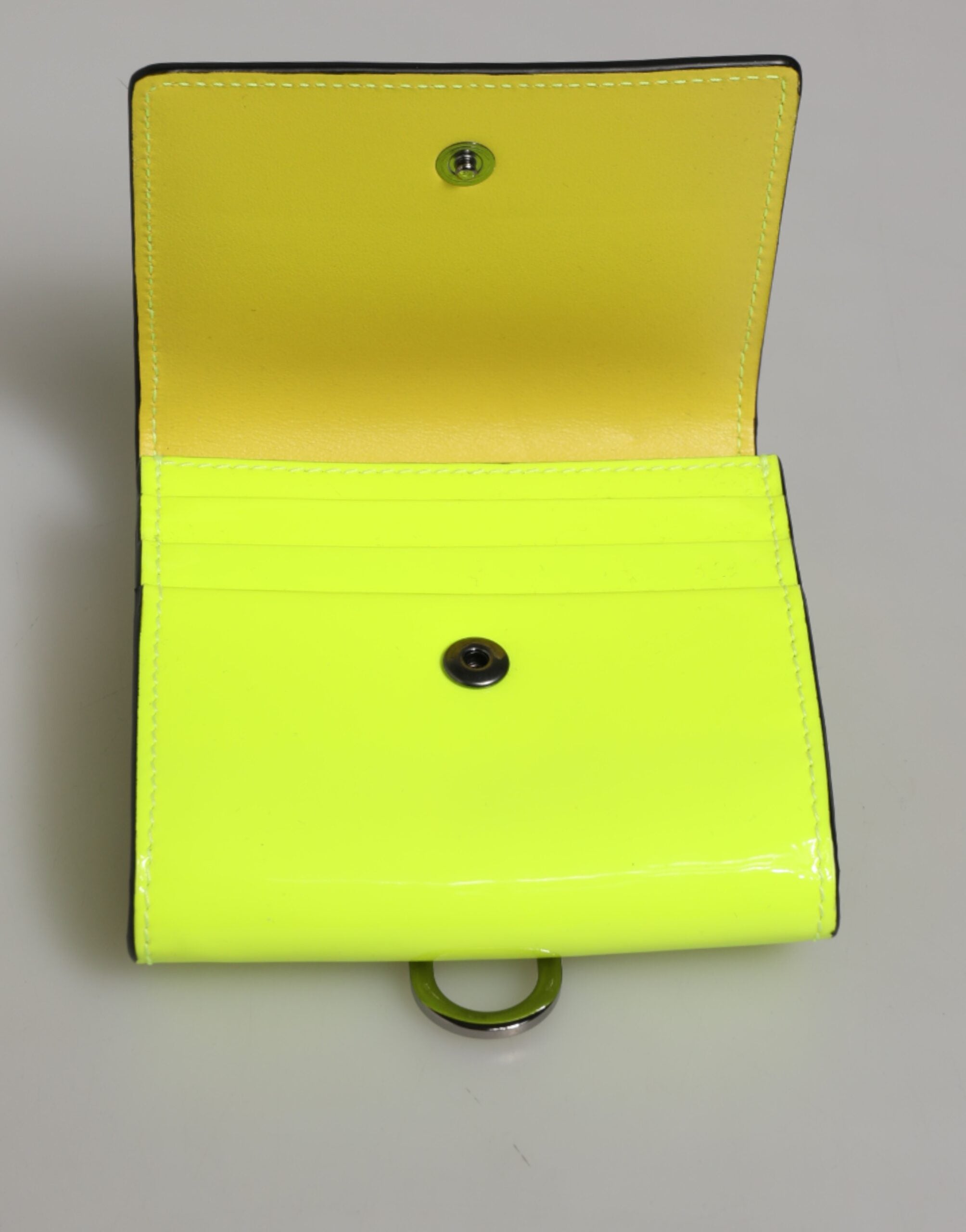 Portacarte a tracolla Dolce & Gabbana giallo verde a libro con logo DG