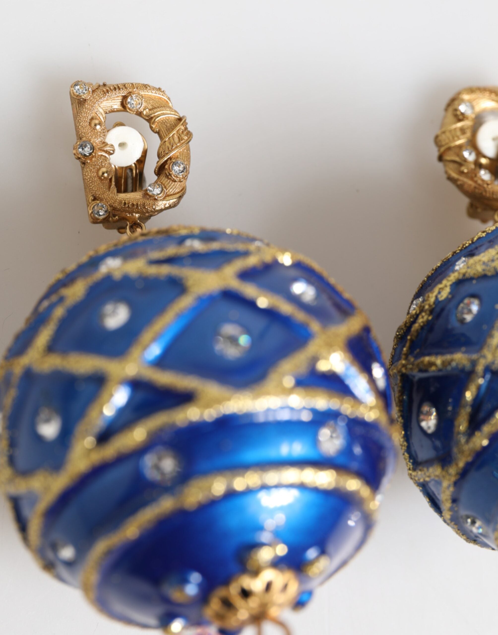 Orecchini a clip con pendente in cristallo a palla di Natale blu in ottone dorato Dolce & Gabbana