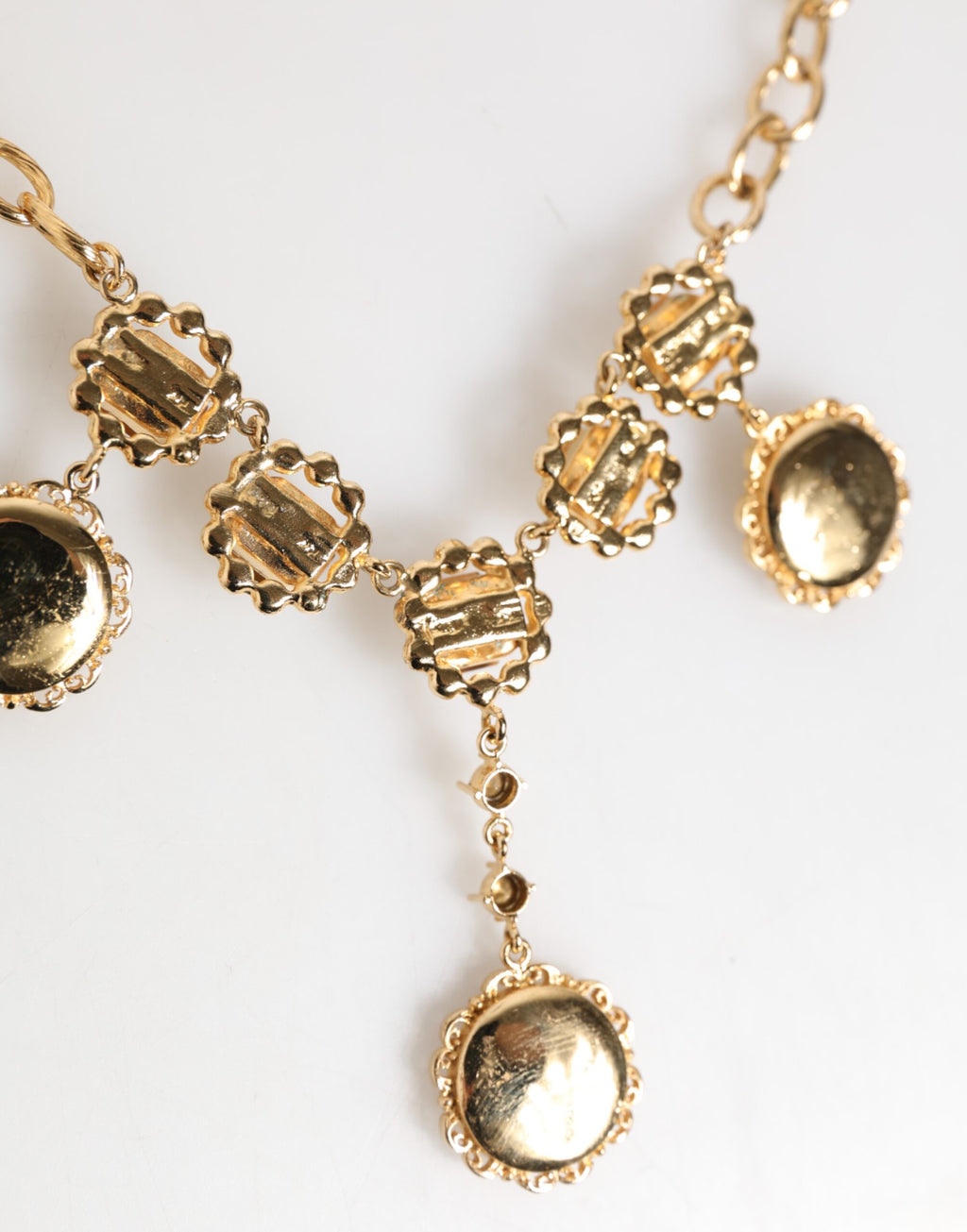 Collana girocollo Dolce & Gabbana con ciondolo a orologio in cristallo dorato