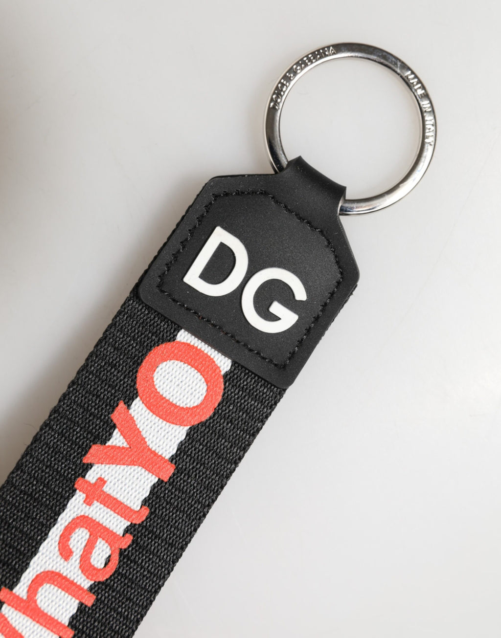 Portachiavi Dolce & Gabbana nero in poliestere con logo e supporto in ottone argentato