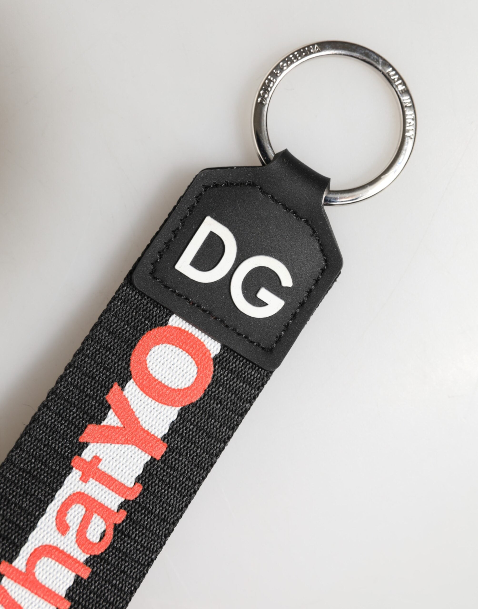 Portachiavi Dolce & Gabbana nero in poliestere con logo e supporto in ottone argentato